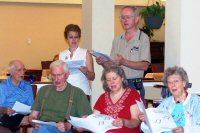 Helen Masters and Rudy Bishop singing with residents